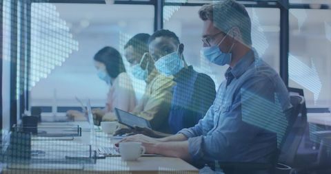 Masked Professionals Analyzing Financial Data During Pandemic