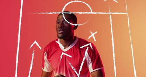 Athlete Planning Strategy in Red-Orange Studio with Basketball Diagram