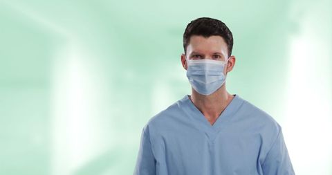 Caucasian Male Doctor Wearing Face Mask in Hospital - Download Free Stock Images Pikwizard.com