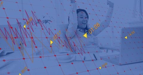 Asian Businesswoman Celebrates Success with Financial Chart