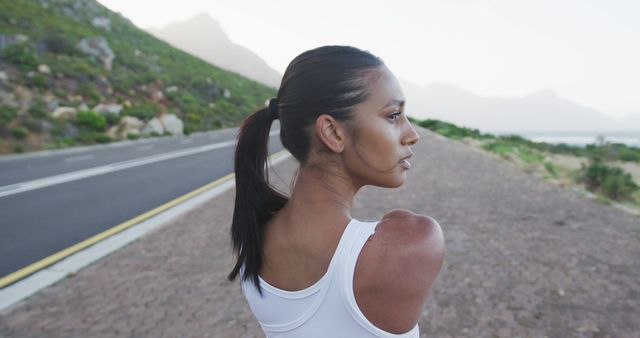 Confident Female Athlete with Amputated Arm Outdoors - Download Free Stock Images Pikwizard.com