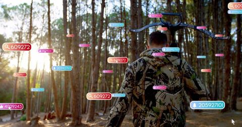 Hunter in camouflage with data overlays in pine forest