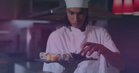 Skillful Chef Preparing Sushi Dish in Contemporary Kitchen