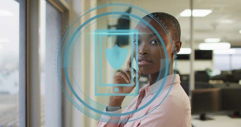 Businesswoman and Digital Security Interface in Modern Office