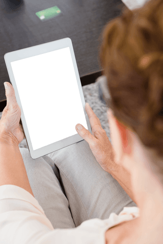 Woman Using Transparent Tablet in Modern Workspace - Download Free Stock Videos Pikwizard.com