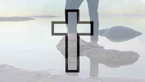 Cross Icon Over Couple Balancing on Rocks in Serene Waterscape