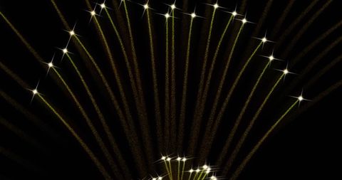 Abstract Golden Fireworks Explosion on Black Background