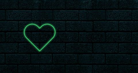 Green Neon Heart Sign on Dark Brick Wall Background - Download Free Stock Images Pikwizard.com