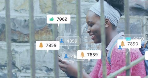 Woman Engaging with Social Media on Smartphone Outdoors