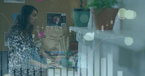 Focused Woman Analyzing Digital Data In Modern Workspace