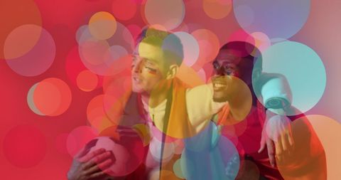 Diverse soccer fans cheering with flag background