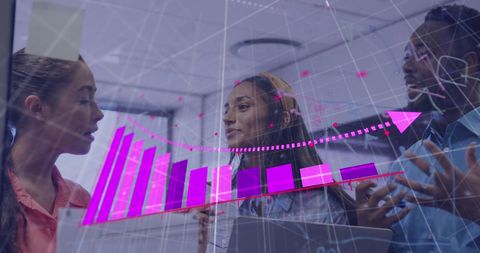 A group of diverse business professionals is focusing on digital financial graphics in an office environment. The overlay of graphs and data suggests a focus on growth and financial analysis through technology. Perfect for illustrating concepts of modern business strategies, collaborative teamwork, and the integration of digital tools for improvement in a professional setting.