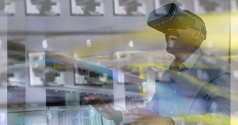 Man Experiencing Virtual Reality and Laughter with Headset - Download Free Stock Images Pikwizard.com