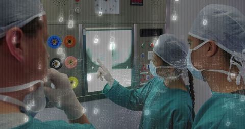 Surgeons examining x-ray at control panel amidst digital overlay