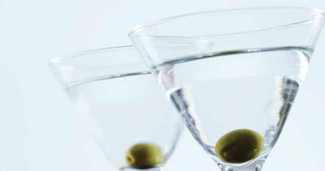 Close-up of Martini Glasses With Olives on White Background - Download Free Stock Images Pikwizard.com