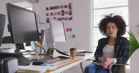 Confident Creative Professional Working in Modern Office Setting