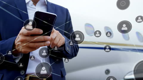 Businessman Networking via Smartphone with Global Connections