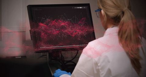 Scientist Analyzing Computational Data in Modern Laboratory - Download Free Stock Images Pikwizard.com