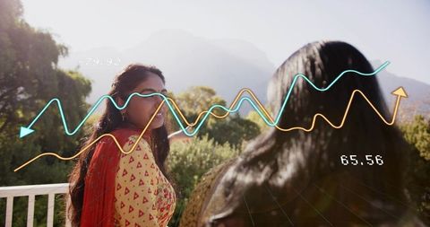 Indian woman on sunlit balcony in yellow kurta with ar overlays and mountain view