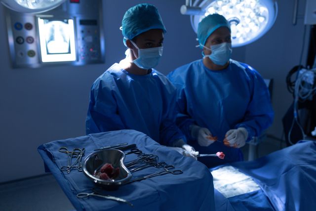 Surgeons Performing Operation in Hospital Operating Room - Download Free Stock Photos Pikwizard.com