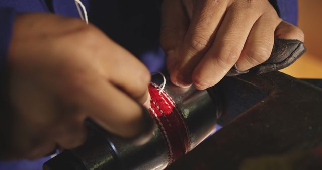 Close-up of Hands Sewing Leather with Red Thread - Download Free Stock Images Pikwizard.com