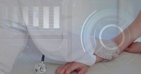 Clinician examining patient with futuristic hud overlay for diagnostics and monitoring