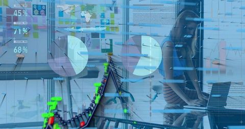 Businesswoman analyzing financial graphs and data in office