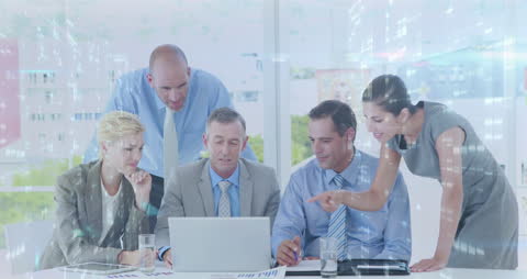 Diverse Business Team Collaborating at Laptop with Digital Composite