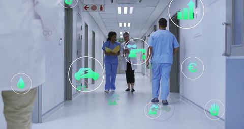 medical professionals walking in hospital hallway with data interfaces - Download Free Stock Images Pikwizard.com