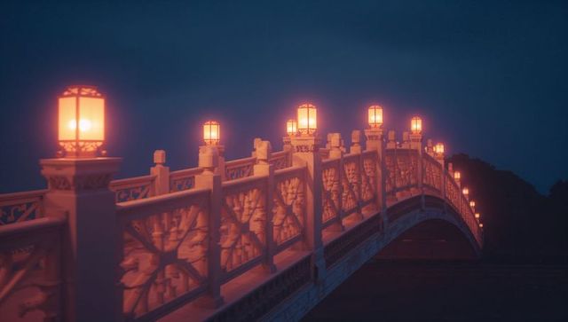 Dusk view of ornate bridge with glowing lanterns over tranquil pond