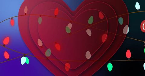 Layered red heart with decorative teardrop lights on gradient