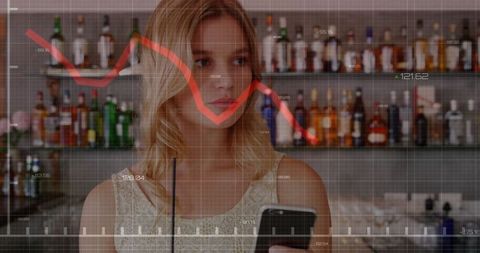 Woman analyzing stock market at upscale bar