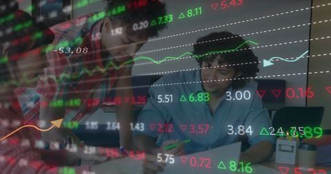 Diverse Team Analyzing Financial Data with Graph Overlays