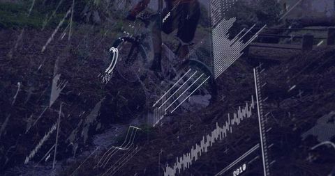 Cyclist Navigating Rainy Forest Trail with Digital Interface