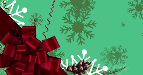 Festive Red Ribbon and Falling Snowflakes on Green Background - Download Free Stock Images Pikwizard.com