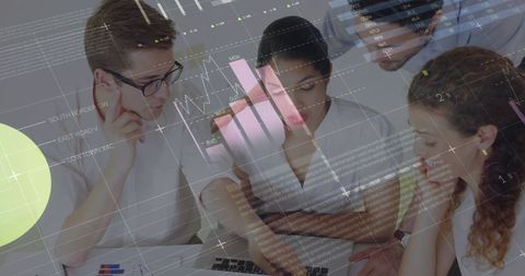 Business Team Analyzing Financial Data During Meeting