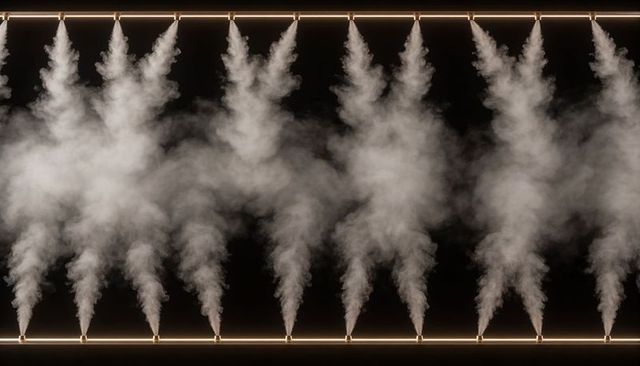 Symmetrical mist nozzles releasing dense white fog with warm led rails and theatrical mood