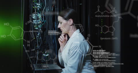 Caucasian Female IT Technician Analyzing Server Data