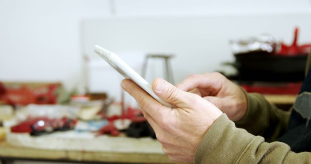 Man Using Tablet in Workshop, Selective Focus on Hands - Download Free Stock Images Pikwizard.com