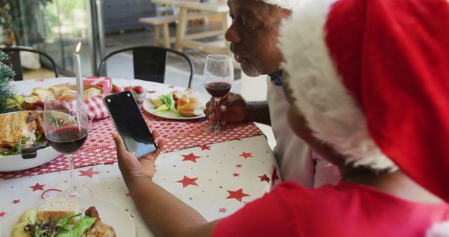 African American Couple Video Calling Family During Christmas Dinner - Download Free Stock Images Pikwizard.com