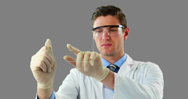 Young scientist interacts with an augmented reality interface, wearing safety glasses and latex gloves, quintessential in a modern laboratory. Perfect for projects related to future technology, scientific research, and innovation in science labs.