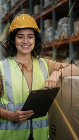 Warehouse worker smiling while reviewing clipboard and monitoring rising logistics data