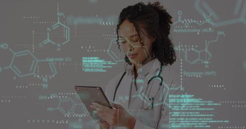 Scientist Analyzing Digital Data with Tablet for Research