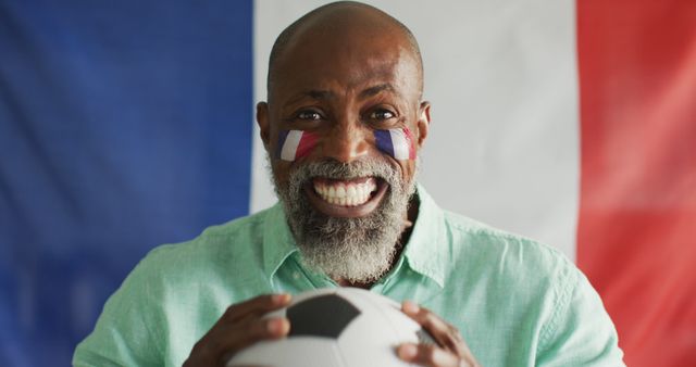 Image of happy african american man with flag of france holding soccer ball - Download Free Stock Photos Pikwizard.com