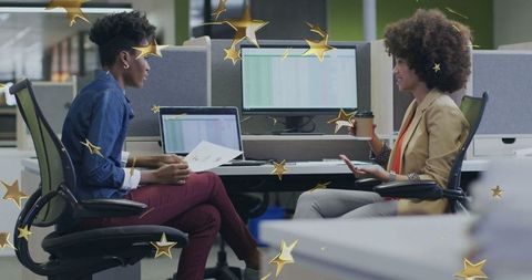 Colleagues Collaborating in Creative Office with Tech