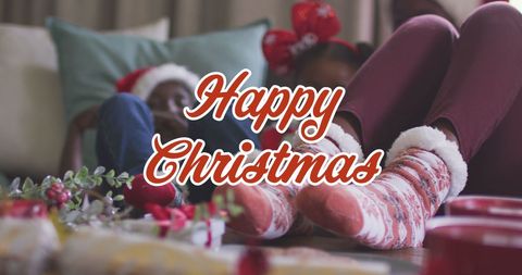 African American Family Relaxing with Christmas Greeting