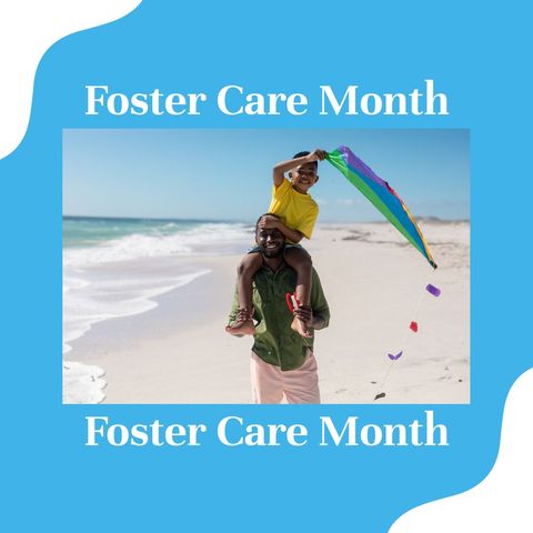 Father and Son on Beach with Kite Celebrating Foster Care