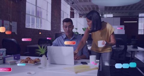 Business Colleagues Collaborating in Modern Open-Plan Office