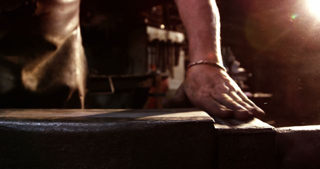 Blacksmith Hand Touching Workbench Close-Up in Workshop - Download Free Stock Images Pikwizard.com