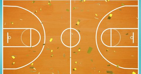 Celebratory Gold Confetti on Basketball Court